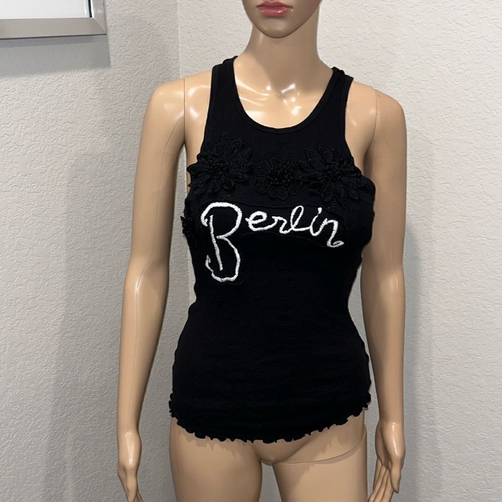 We The Free black tank top w/ flower motif.